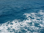28082 White foam of boat on blue ocean.jpg